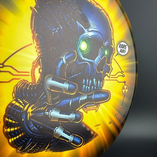 Gold Pure Stratus Fear V3 disc golf disc by Rare Air Discs, featuring detailed artwork by Les White and Dan Kemp.
