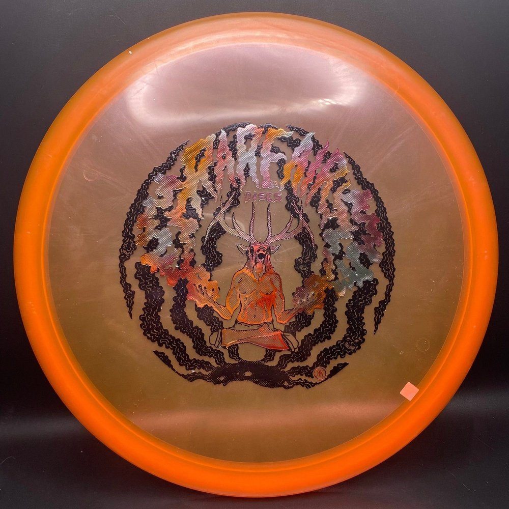 Creamy peach and orange Sunset Eternal Mustang Midrange disc golf disc by Rare Air Discs with Elk Stamp design.